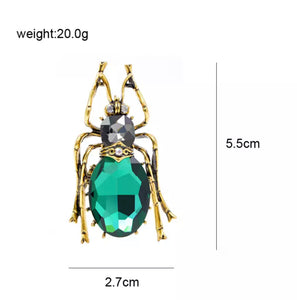 Brosche Käfer Gold mit grünem Stein